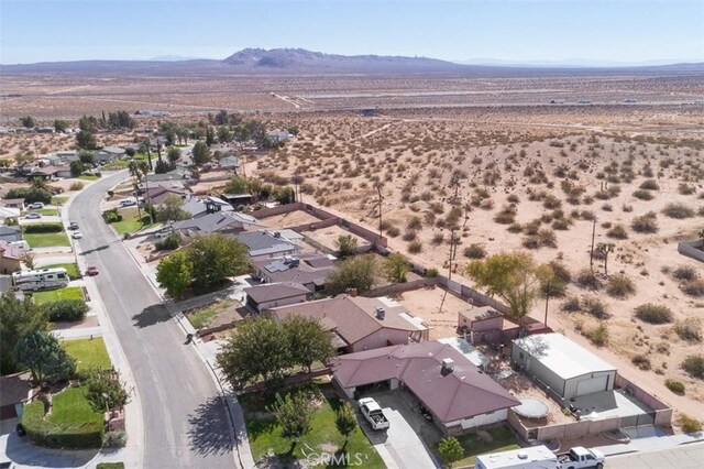 bird's eye view with a mountain view