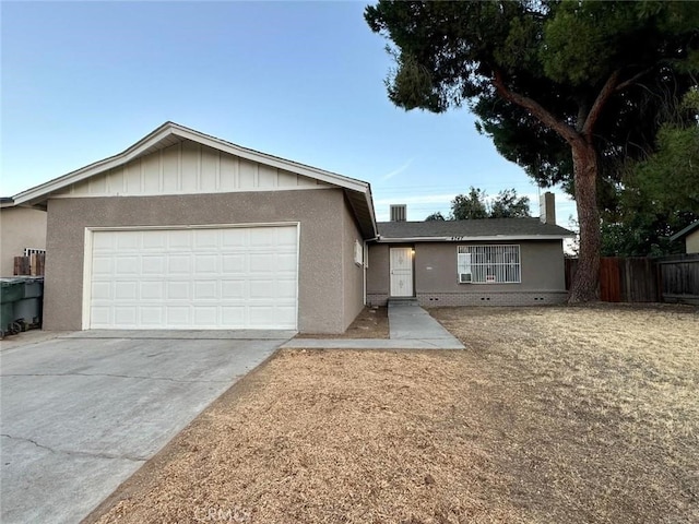 ranch-style home with a garage