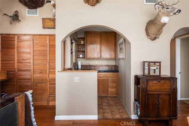 kitchen with wood-type flooring