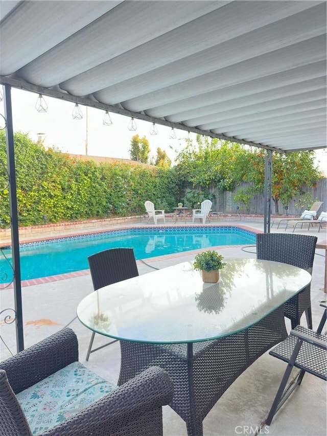 view of pool featuring a patio