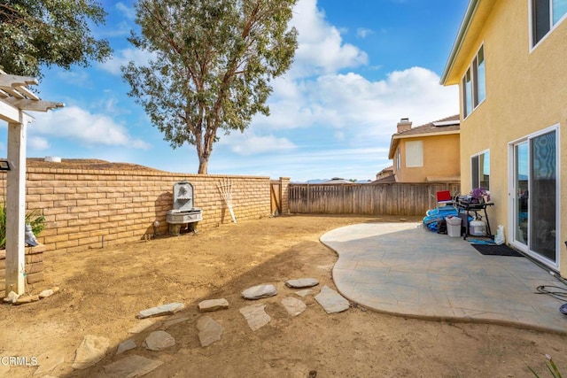 view of yard with a patio area