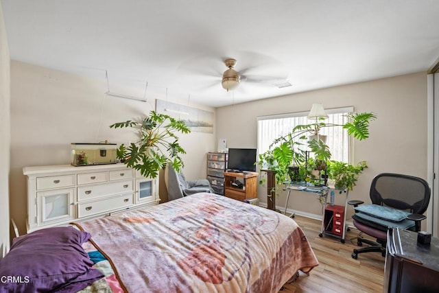 bedroom with light wood-type flooring