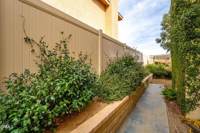 exterior space featuring a fenced backyard