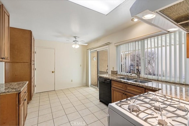 kitchen featuring black dishwasher, sink, ceiling fan, white range with gas stovetop, and light tile patterned floors