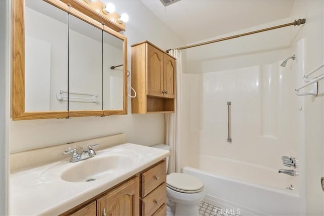 full bathroom with washtub / shower combination, toilet, and vanity