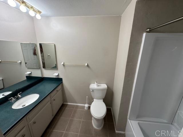 full bathroom with vanity, shower / bath combination, and toilet