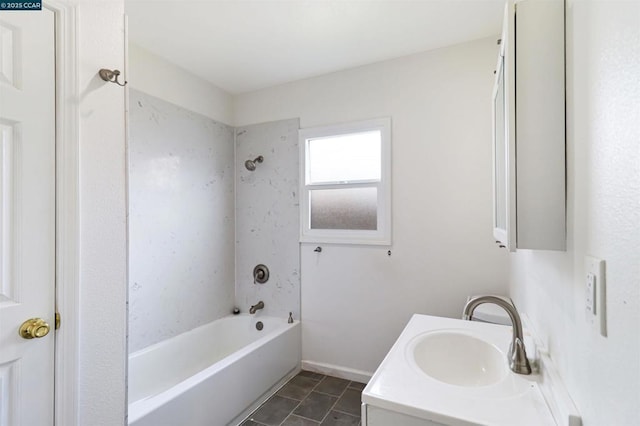 bathroom featuring shower / bath combination and vanity