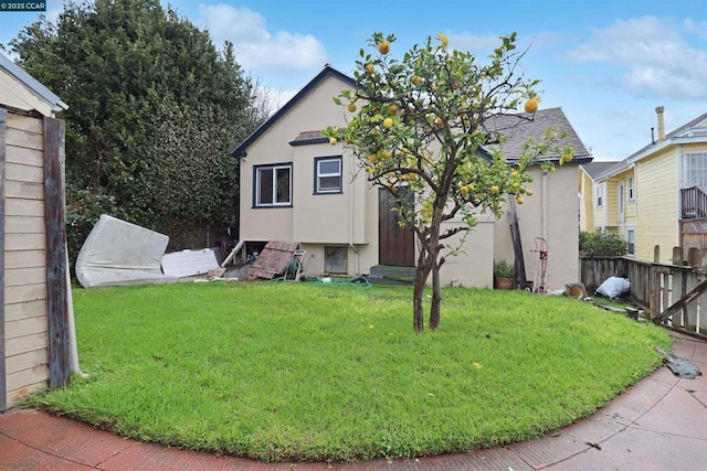 view of front of property with a front lawn