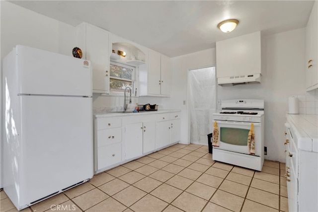 10394 Baker Rd, Lucerne Valley, CA 92356 - kitchen featuring white cabinetry, sink, ventilation hood, and white appliances