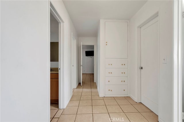 10394 Baker Rd, Lucerne Valley, CA 92356 - corridor featuring light tile patterned floors