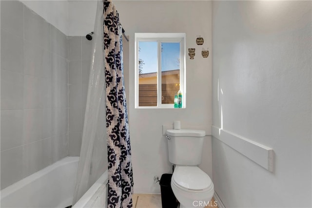 10394 Baker Rd, Lucerne Valley, CA 92356 - bathroom with toilet and shower / bathtub combination with curtain