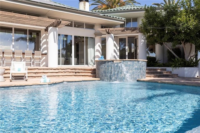 outdoor pool with a patio