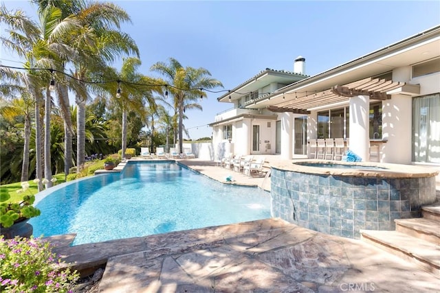 view of swimming pool with a patio area, an infinity pool, a pergola, and an in ground hot tub