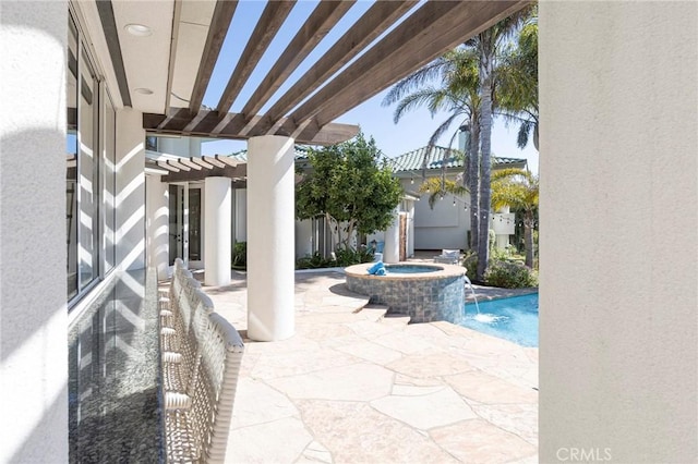 view of patio / terrace featuring a pool with connected hot tub, fence, and a pergola