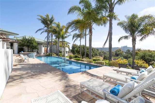 pool featuring a patio area