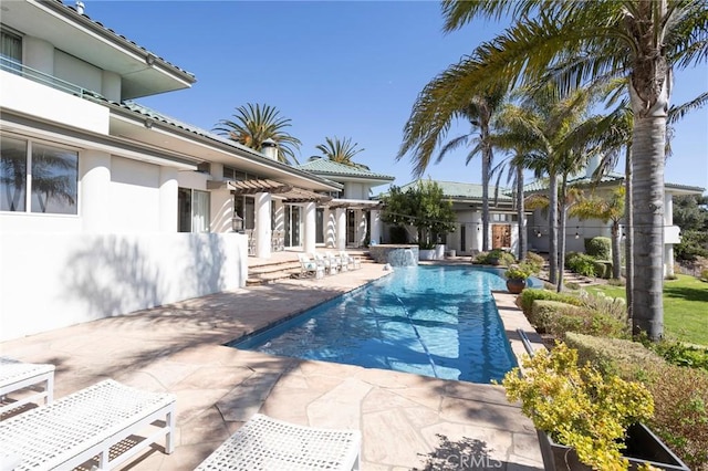 pool featuring a patio area and a pergola