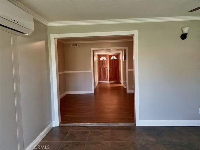 entrance to property featuring a wall unit AC