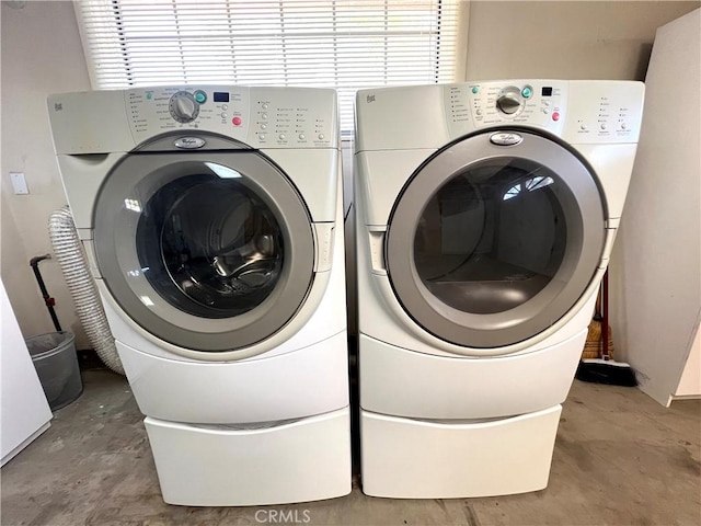 laundry area featuring separate washer and dryer