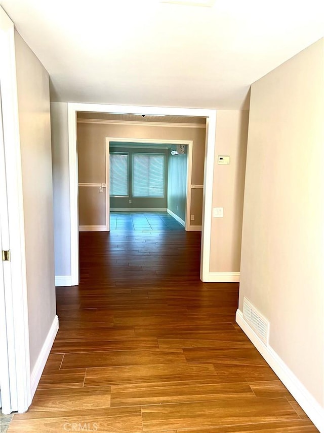 hallway featuring hardwood / wood-style floors