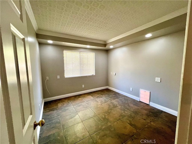 spare room featuring ornamental molding