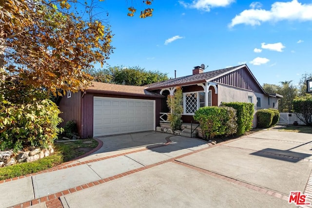 ranch-style house featuring a garage