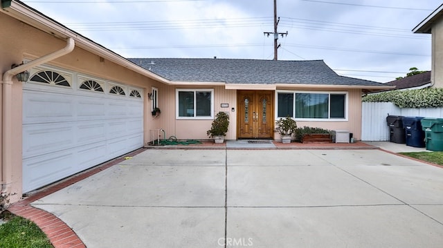 ranch-style home with a garage