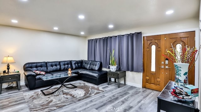 living room with hardwood / wood-style flooring