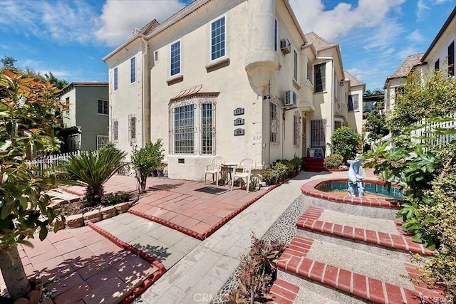 back of house featuring a patio