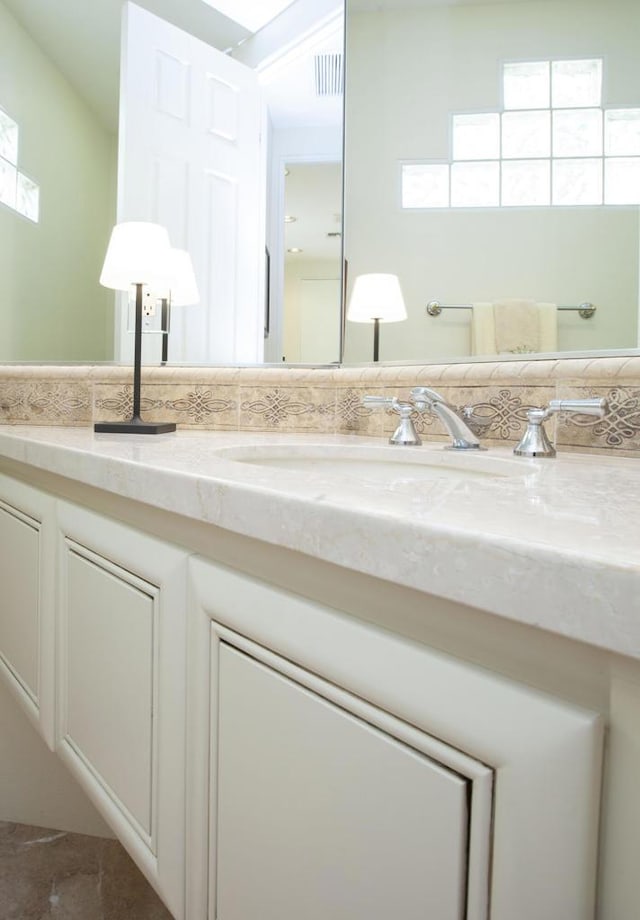 bathroom with vanity