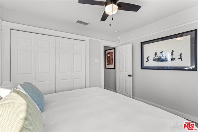 bedroom with a closet and ceiling fan