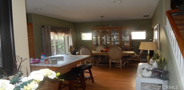 dining space featuring hardwood / wood-style floors