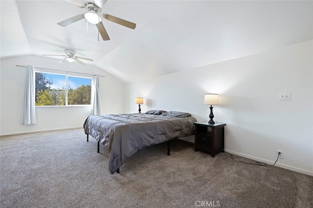 bedroom with ceiling fan, lofted ceiling, and carpet floors