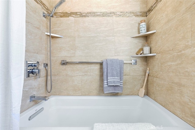 bathroom with shower / tub combo with curtain