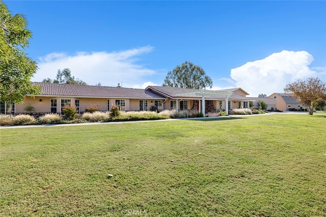 ranch-style house with a front yard