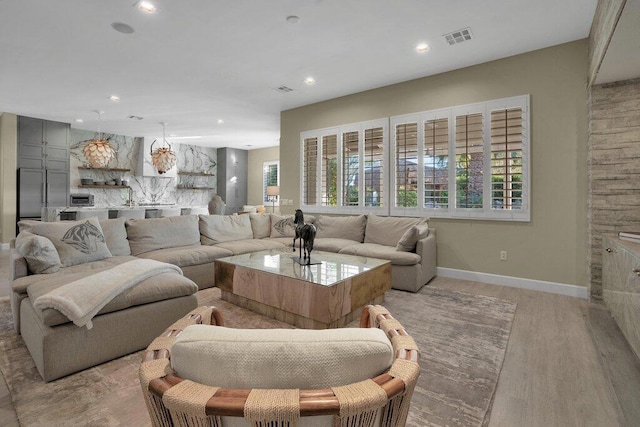 living room featuring light hardwood / wood-style floors