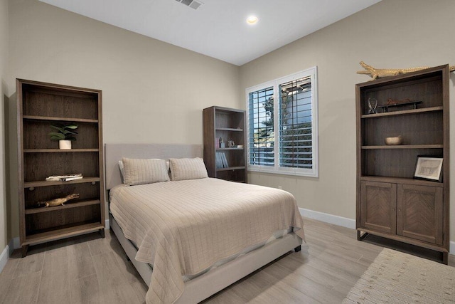 bedroom featuring light hardwood / wood-style flooring