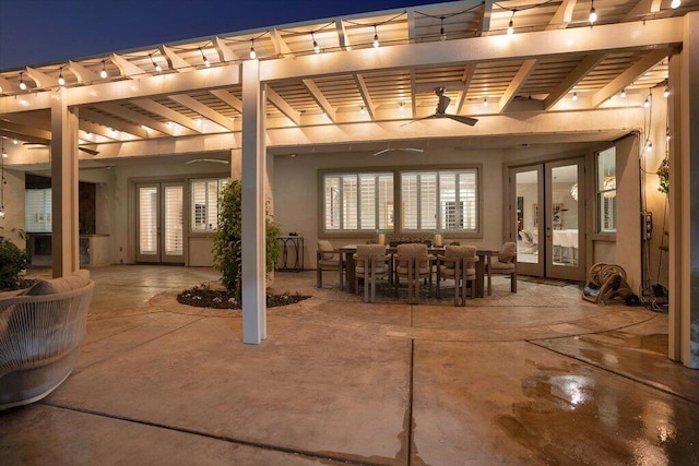 view of patio featuring a pergola and french doors