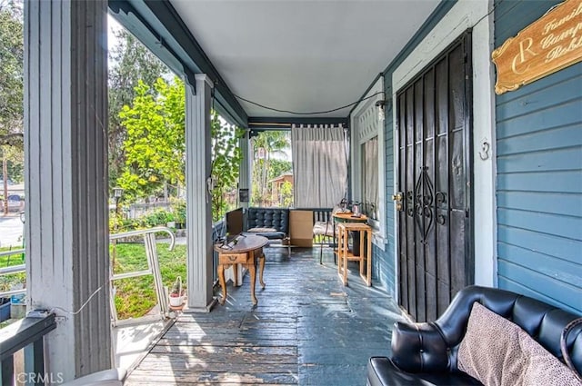 sunroom / solarium with a healthy amount of sunlight