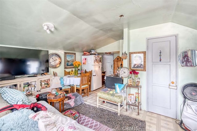 living room with vaulted ceiling