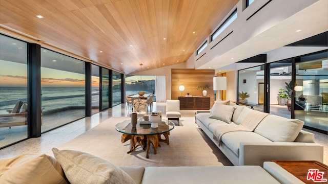 living room featuring a water view, vaulted ceiling, and wooden ceiling