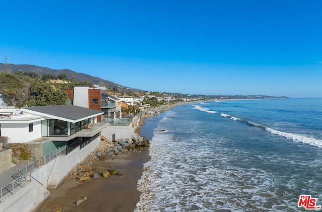 property view of water with a beach view