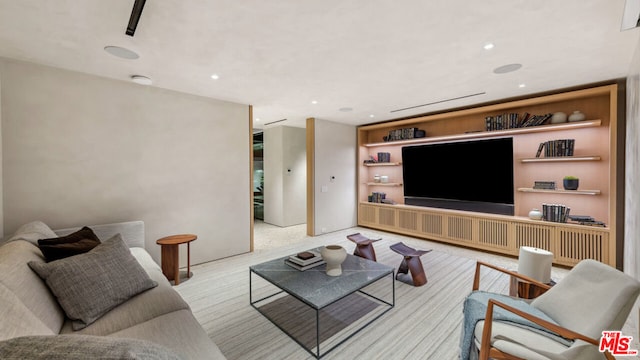 living room with light colored carpet