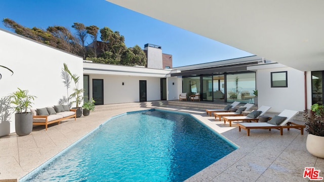 view of pool with a patio area