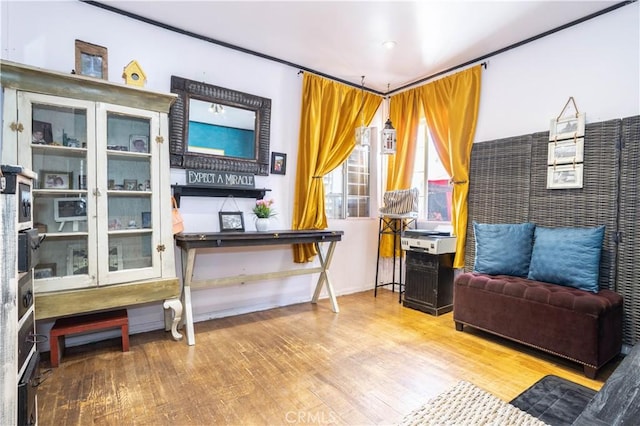 living area with wood-type flooring