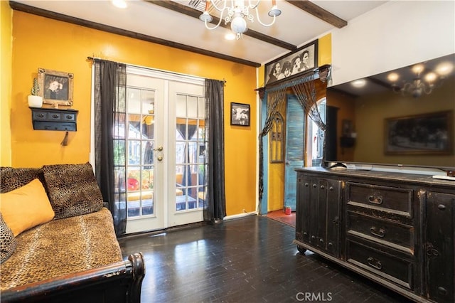 interior space featuring beam ceiling, dark hardwood / wood-style flooring, french doors, and a notable chandelier