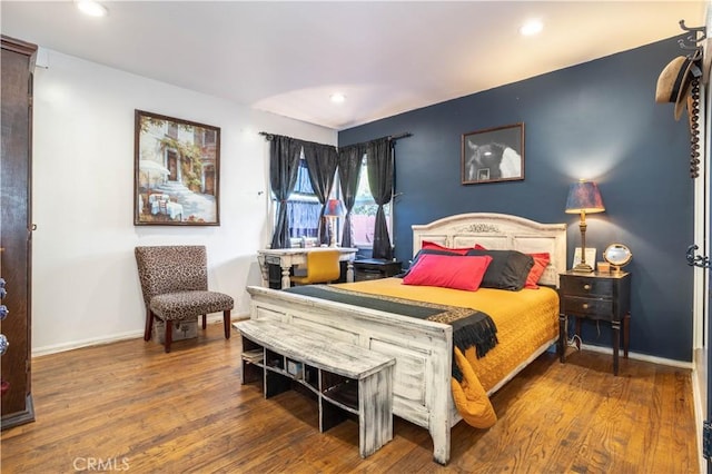 bedroom featuring wood-type flooring