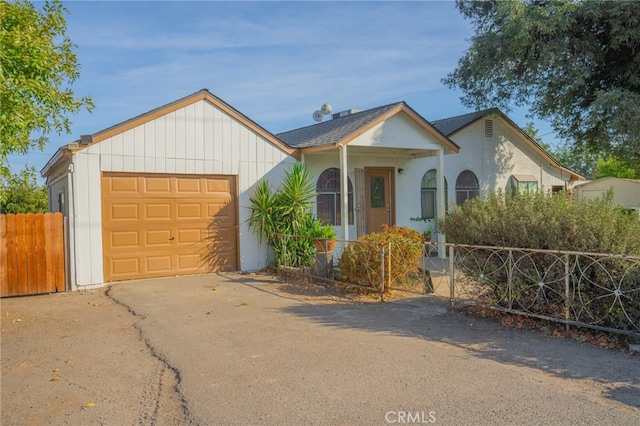 view of front of property with a garage