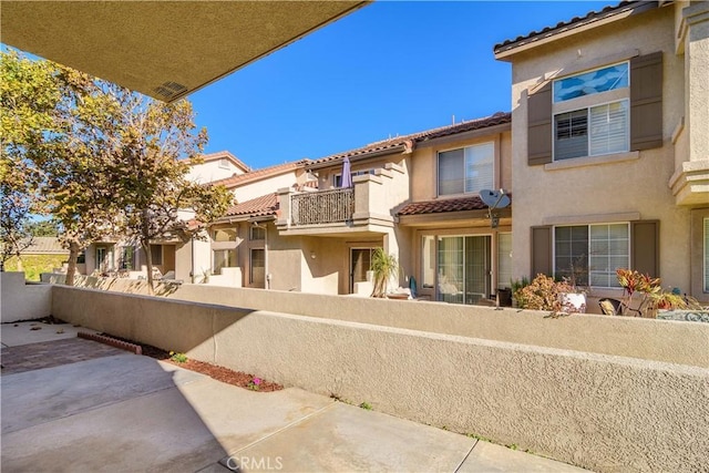 view of front of property with a patio area