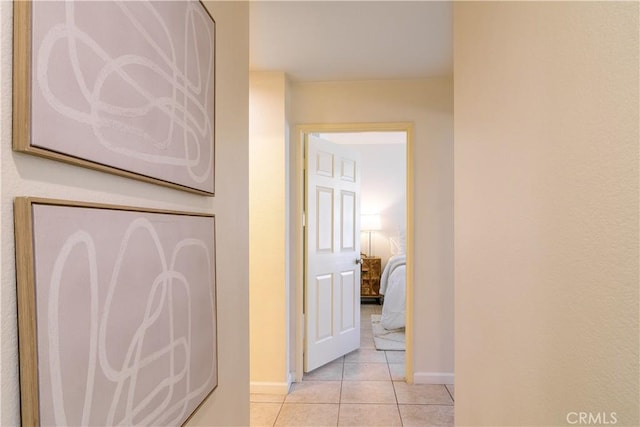 hallway with light tile patterned flooring