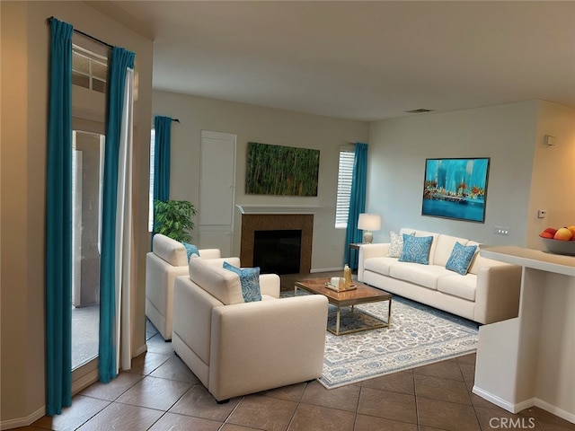 living room with tile patterned flooring